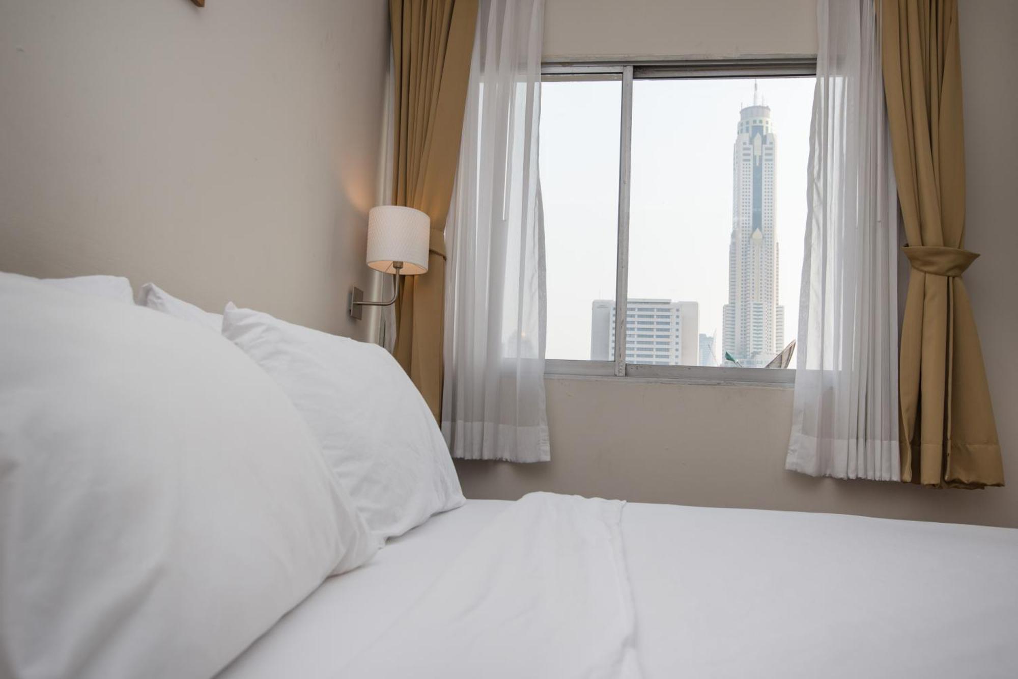 Seasons Siam Hotel Банкок Стая снимка